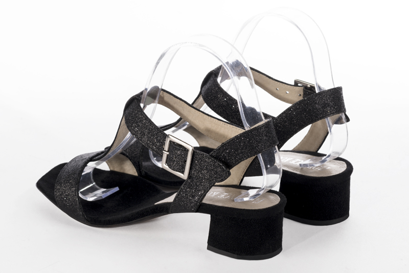 Gloss black women's fully open sandals, with an instep strap. Square toe. Low flare heels. Rear view - Florence KOOIJMAN